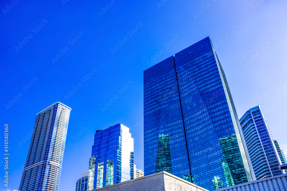 Downtown Miami cityscape view with condos and office buildings. Downtown Miami cityscape view with condos and office buildings.