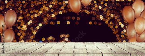 Table with fireworks and golden ballons photo