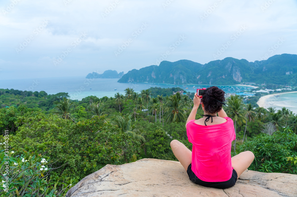 young cute hipster girl travelling at beautiful blue sky paradise tropical  coast beach PP Island Krabi Phuket Thailand guiding idea for long weekend  female relax rest woman women planning life