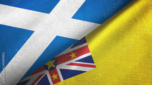 Scotland and Niue two flags textile cloth, fabric texture