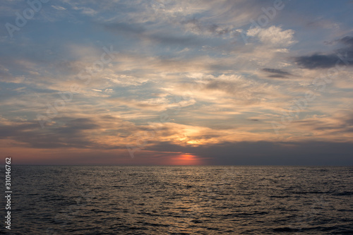 Beautiful sunset on the sea perfect background © Anna Pismenskova