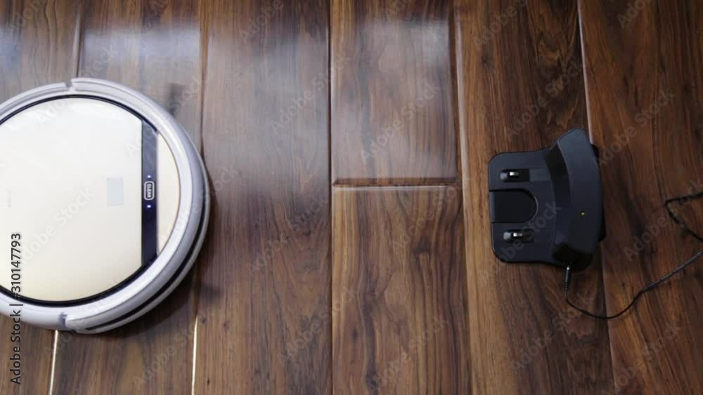 the robotic vacuum cleaner drives to its loading station. The LED Lights lighten up whilst the charging process begins the robotic vacuum cleaner drives to its loading station. The LED Lights lighten up whilst the charging process begins
