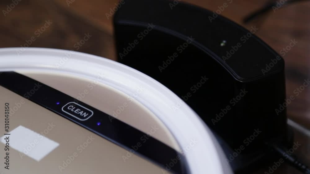 the robotic vacuum cleaner drives to its loading station. The LED Lights lighten up whilst the charging process begins the robotic vacuum cleaner drives to its loading station. The LED Lights lighten up whilst the charging process begins