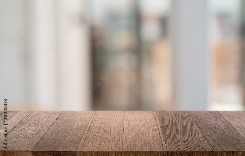 Empty dark wooden table in front of abstract blurred bokeh background of restaurant . can be used for display or montage your products.Mock up for space. Empty dark wooden table in front of abstract blurred bokeh background of restaurant . can be used for display or montage your products.Mock up for space.