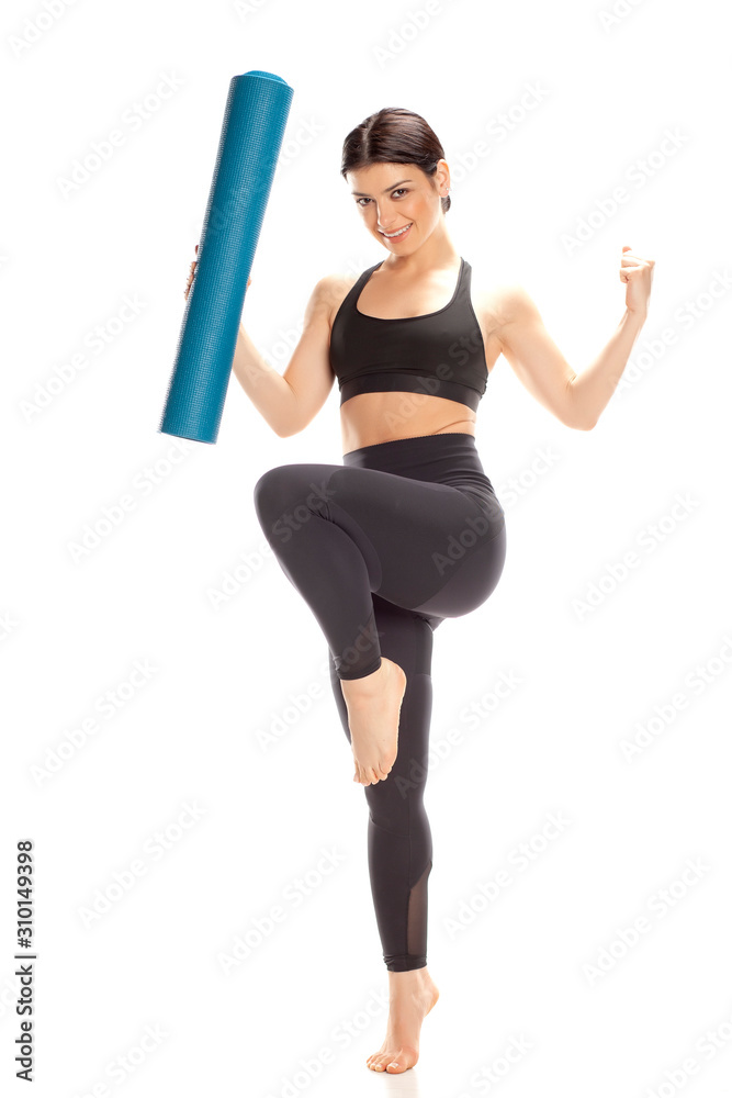 Young happy yoga woman on white background. Young happy yoga woman on white background.