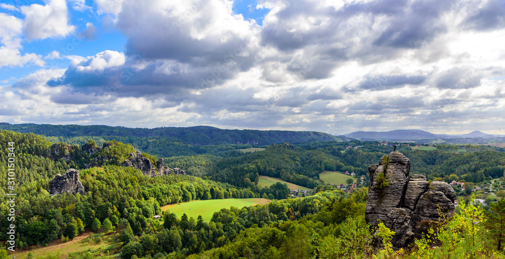 Bastei Rocks in Swiss Saxony, beautiful landscape scenery around the ruins of Neurathen Castle, Elbe Sandstone Mountains in Saxon Switzerland, Germany, Europe.