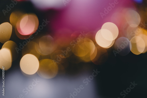 Abstract circle bokeh light background with decorations in holiday of Christmas.