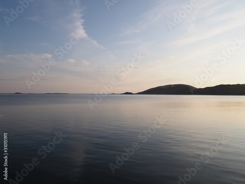 Desolate evening view to bay and coastline in european Bodo city at Salten region in Norway