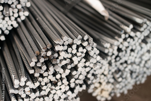Building armature in the warehouse of metallurgical factory. Close-up of building armature.
