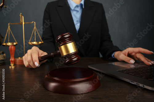 Wallpaper Mural Judge gavel ,law books with attorney or lawyer provide legal advice and consoling to his clients in background. Divorce ,Family law concept. Torontodigital.ca