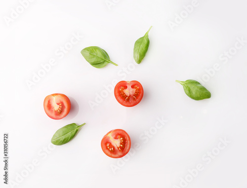 Red ripe cherry tomatoes on white background. Top view