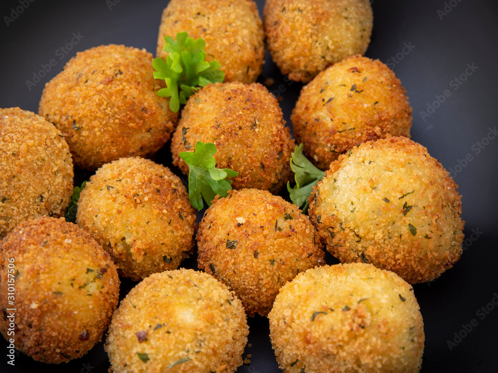 Deep Fried Risotto Balls with herbs