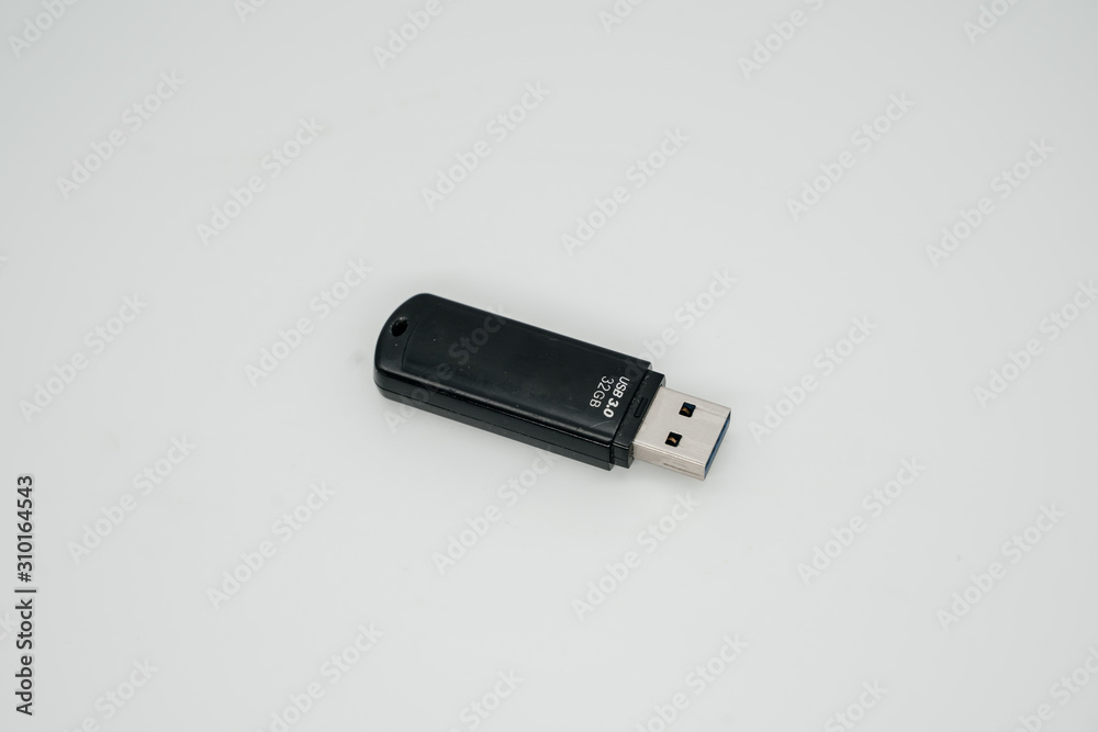 Old usb flash drive on a light background close up Old usb flash drive on a light background close up