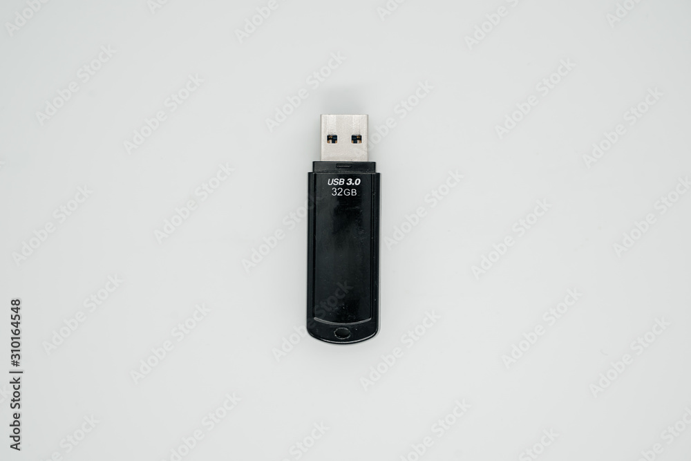 Old usb flash drive on a light background close up Old usb flash drive on a light background close up