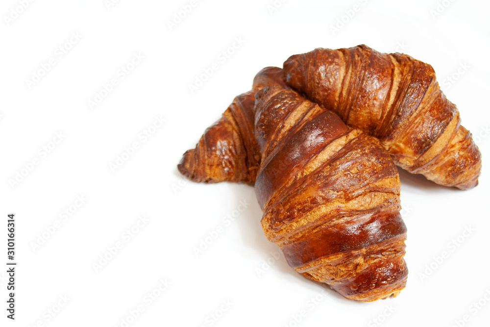 Delicious croissants on a white background