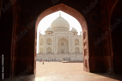 Agra, Uttar Pradesh, India - April, 2014: Side view of The Taj Mahal mausoleum, one of the seven wonders. Heritage building in Arabic style also is a mosque.