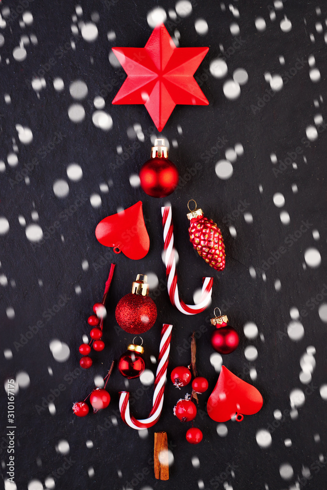 Red Christmas tree with snow on dark Xmas card background Red Christmas tree with snow on dark Xmas card background
