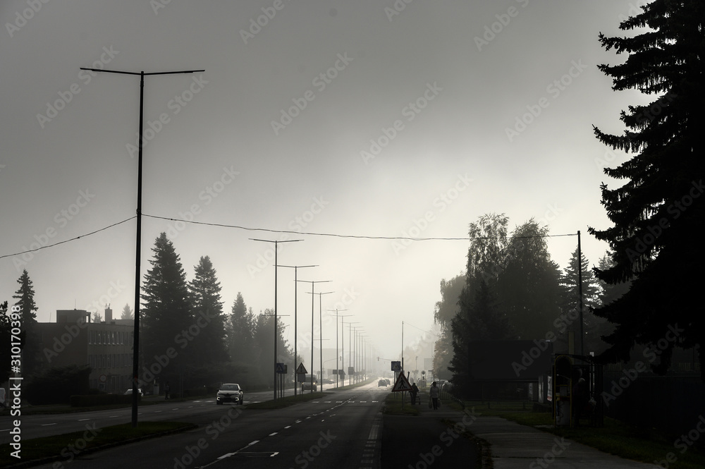 City in haze at day, air pollution concept photo