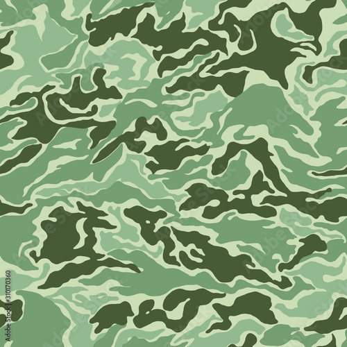Camouflage military pattern in green.Texture or background