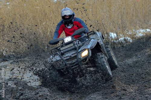 Fototapeta Naklejka Na Ścianę i Meble -  Buggy extreme ride on mud and water