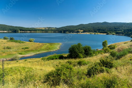 Summer landscape along the road to Camigliatello, Sila. Cecita lake