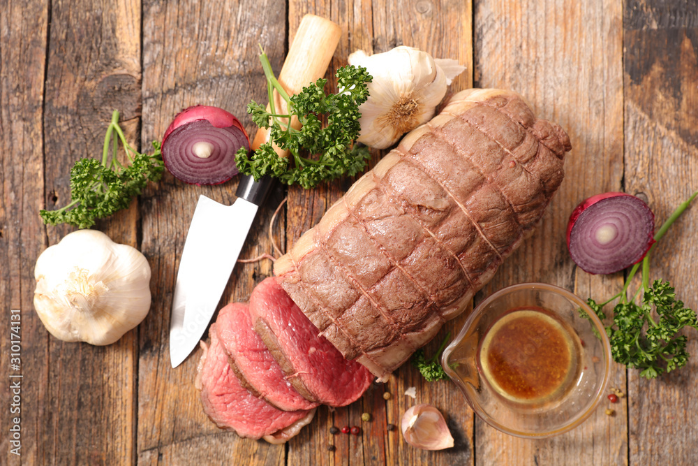 roast beef sliced with sauce and spice roast beef sliced with sauce and spice