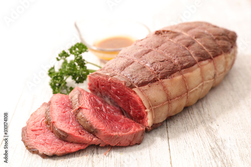roast beef sliced with sauce and spice