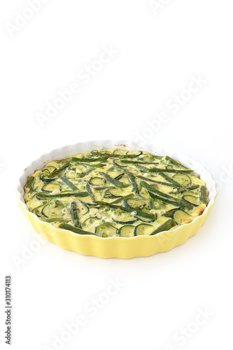 Homemade Asparagus and Zucchini Quiche Isolated On White