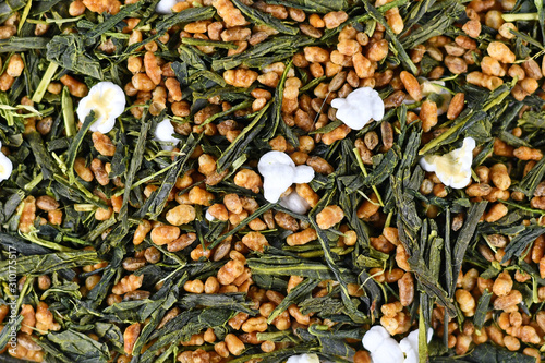 Top view of Japanese 'Genmaicha' tea, a brown rice green tea consisting of green tea mixed with roasted popped brown rice photo