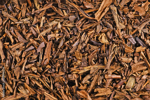 Top view of dried 'Hojicha' tea leaves, a reddish brown roasted Japanese tea made from common 'Bancha' tea