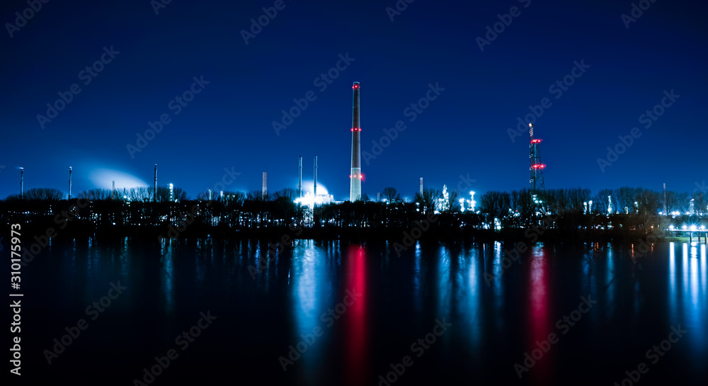 River rhine with factory in the background nightshot