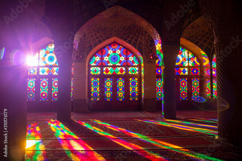 Shiraz, Iran. Nasir-ol-molk Mosque is full of colorful light in the morning. Interior view.