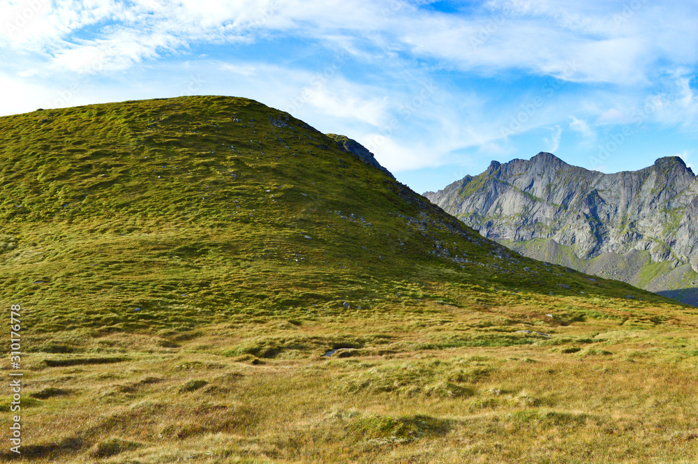 Hike through the mountains on Lofoten Islands in Norway