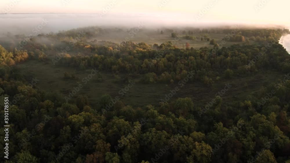 The remain of the reef of the ancient sea, composed of limestone - shikhan Yuraktau. Indian summer in the floodplain of the Belaya River. Aerial view. The remain of the reef of the ancient sea, composed of limestone - shikhan Yuraktau. Indian summer in the floodplain of the Belaya River. Aerial view.