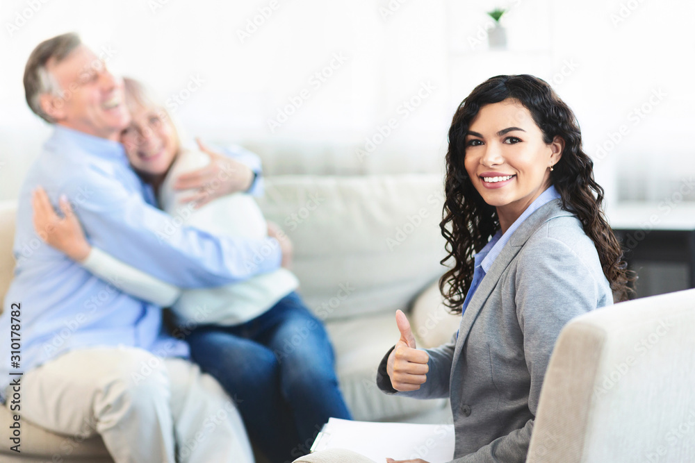 Happy elderly couple hugging after successful therapy Happy elderly couple hugging after successful therapy