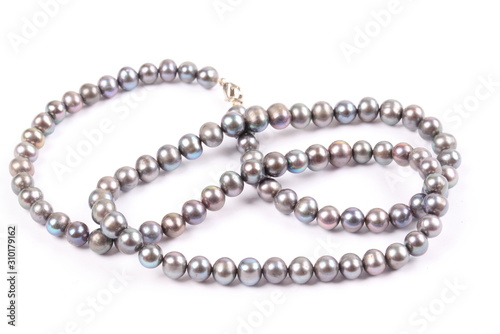 Bead made from wild natural black pearls.