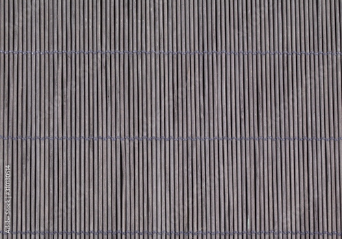 Photo of bamboo mat as abstract texture background side view