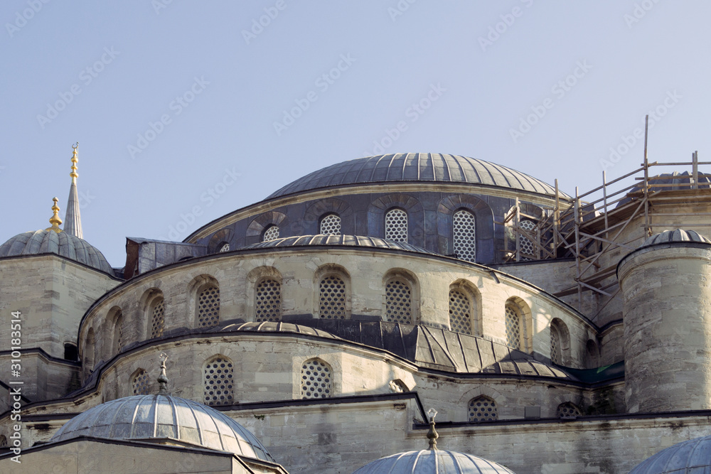 the roof of the ancient mosque against the sky