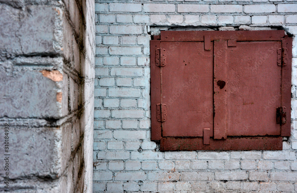 old wooden door in brick wall old wooden door in brick wall