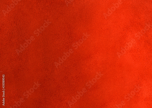 The reverse side of the skin with a textured rough surface of red color.Texture or background