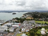 Paihia, Bay of Islands / New Zealand - December 16, 2019: The Scenic Seaside Village of Paihia at the Bay of Islands