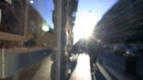 Wallpaper Mural Slow motion blurred anonymous people walking on city street Torontodigital.ca