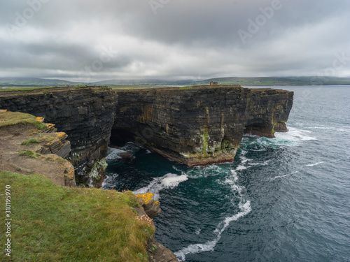 Scenic view of the cliffs along coast, Downpatrick Head, Killala, County Mayo, Ireland