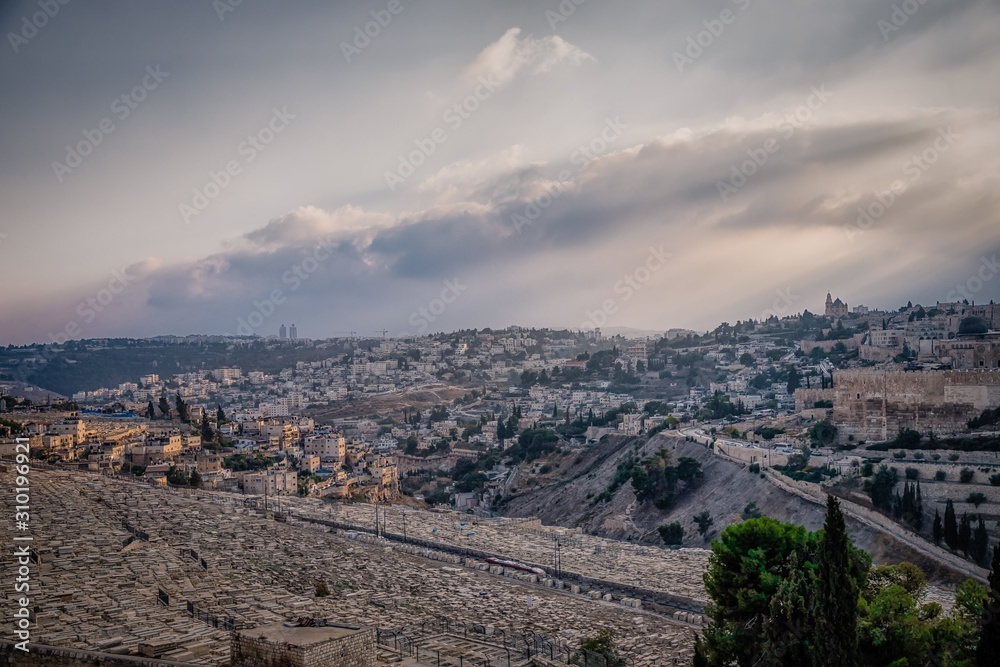 Beautiful view of jewish cemetery and Jerusalem Old City from the Mount of Olives. Israel. Evening light