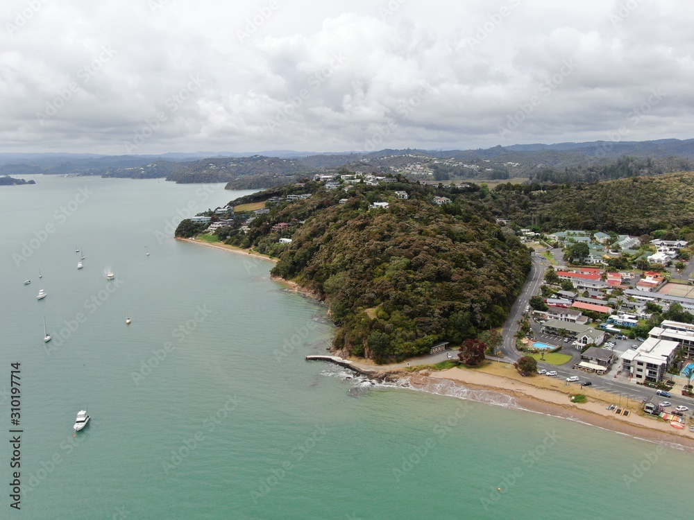 Paihia, Bay of Islands / New Zealand - December 16, 2019: The Scenic Seaside Village of Paihia at the Bay of Islands