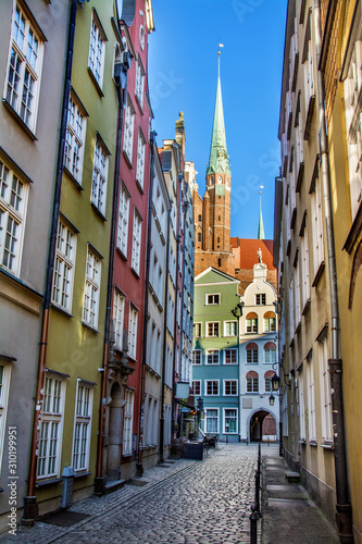 narrow street and beautiful typical colorful houses buildings in old historical town centre, Gdansk, Poland © VinyLove Foto