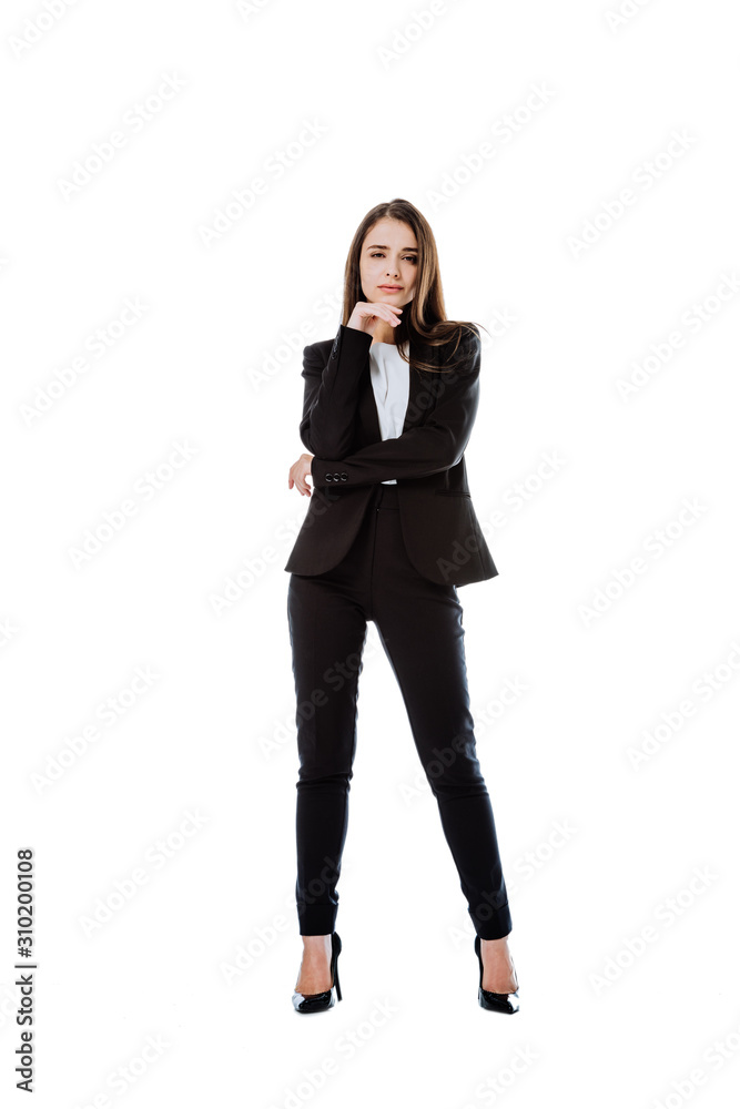full length view of confident businesswoman in suit posing isolated on white full length view of confident businesswoman in suit posing isolated on white
