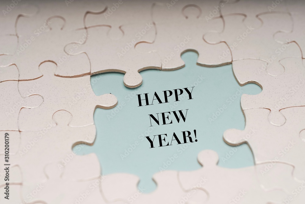 Happy New Year wordings with puzzle pieces Happy New Year wordings with puzzle pieces