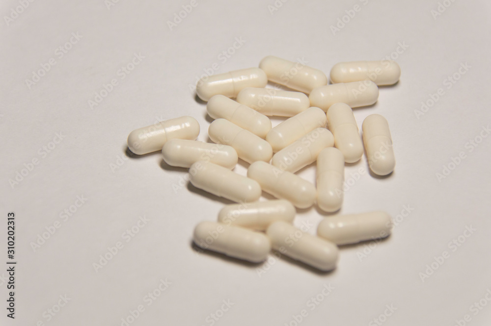 A lot of pills. A medicine for a sick person.