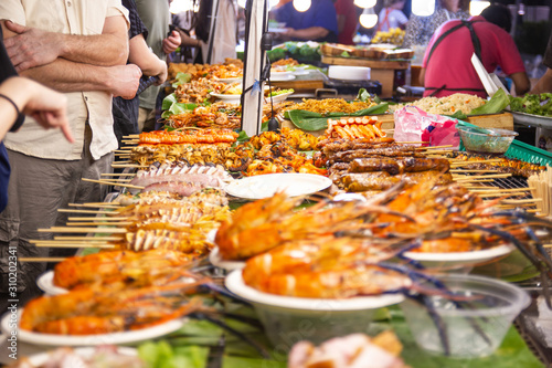 street foods of Thailand, foods styleGrilled seafood feast for the party at night market Bangkok of Thailand